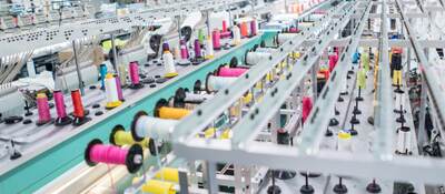 Embroidery machine at a clothing factory.